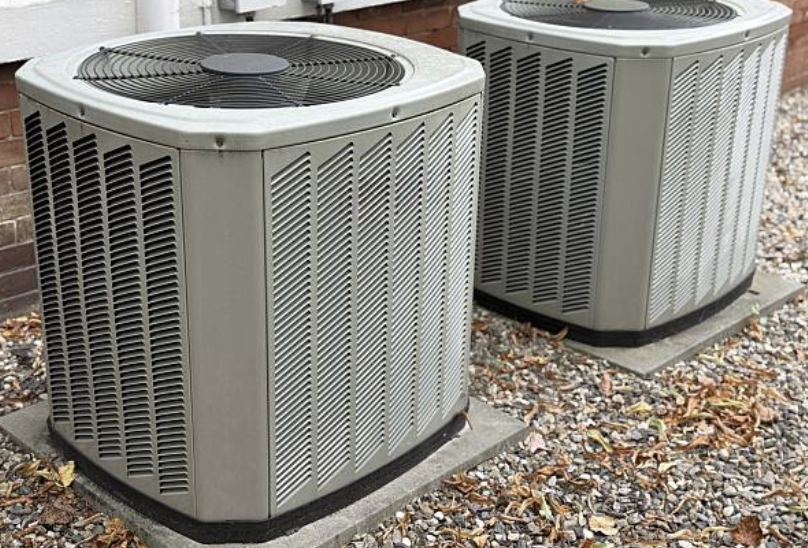 Two outdoor air conditioning condenser units